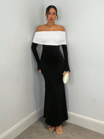 Dress to impress in this elegant and versatile black and white off-shoulder dress. Perfect for casual dates and nights out, its long sleeves and unique design will make you stand out from the crowd. So go ahead and show off your style with this must-have dress.