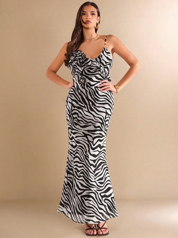 Unleash your wild side with this elegant black and white zebra print backless dress! Perfect for spring and summer vacations, its unique 3D floral ruffles add a touch of whimsy to your wardrobe. Let this dress be your statement piece and turn heads wherever you go!