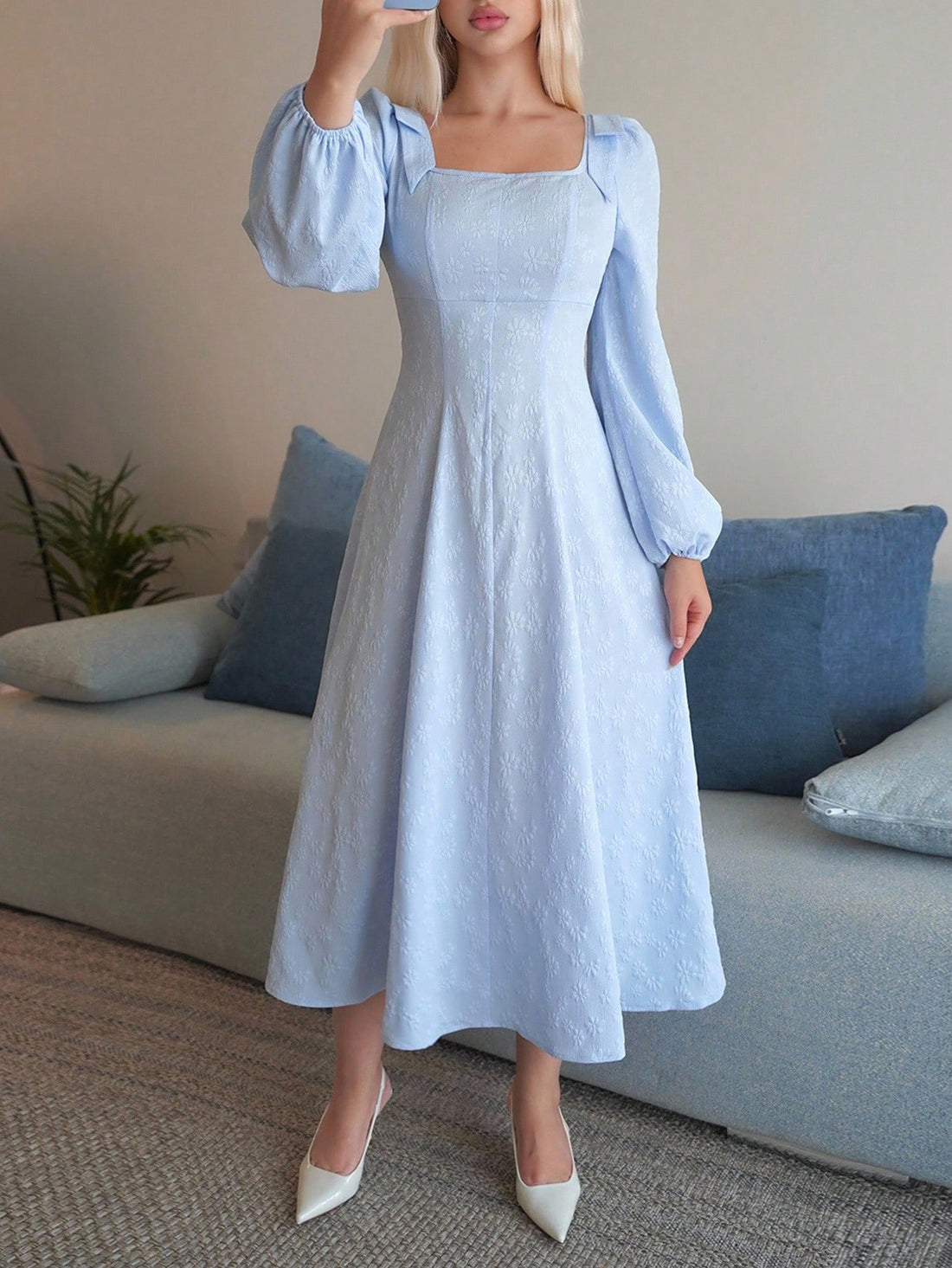 Step into charm with this Elegant Blue Daisy Textured Dress! Featuring a playful square collar and a sweet bow detail, it brings a fresh, lively vibe to your wardrobe. The delicate daisy texture adds a touch of whimsy, making it your go-to for everything from garden parties to casual brunches. Light, bright, and effortlessly stylish—this dress is ready to turn heads and brighten any occasion.