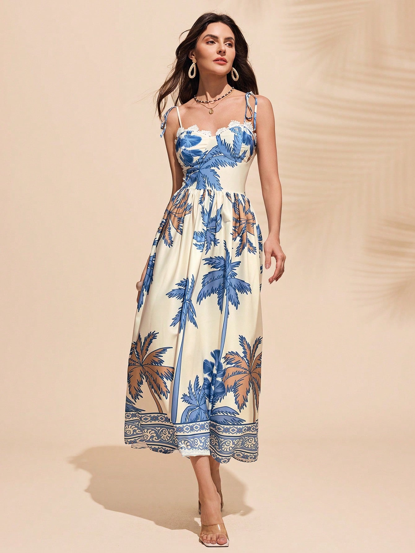 Get ready to make a statement at the beach with this Elegant Blue Floral Print Dress. Perfect for beach holidays, this dress combines style and comfort in one playful package. Embrace your unique sense of fashion with ease in this must-have dress!