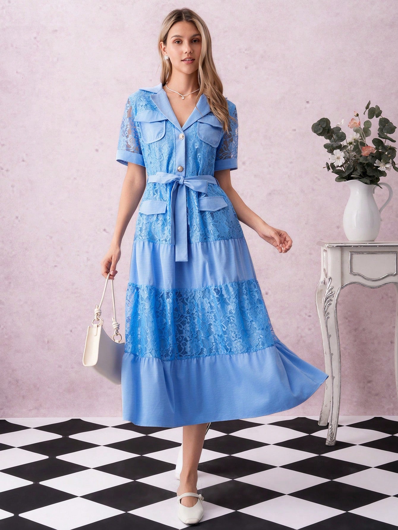 Step into summer with this Elegant Blue Lace High Waist Long Dress designed to turn heads. Its delicate lace and flattering high waist create a silhouette that dances with every breeze. Perfect for sunny days or moonlit nights, this dress adds a touch of whimsy and charm to your warm-weather wardrobe. Let your style bloom effortlessly!