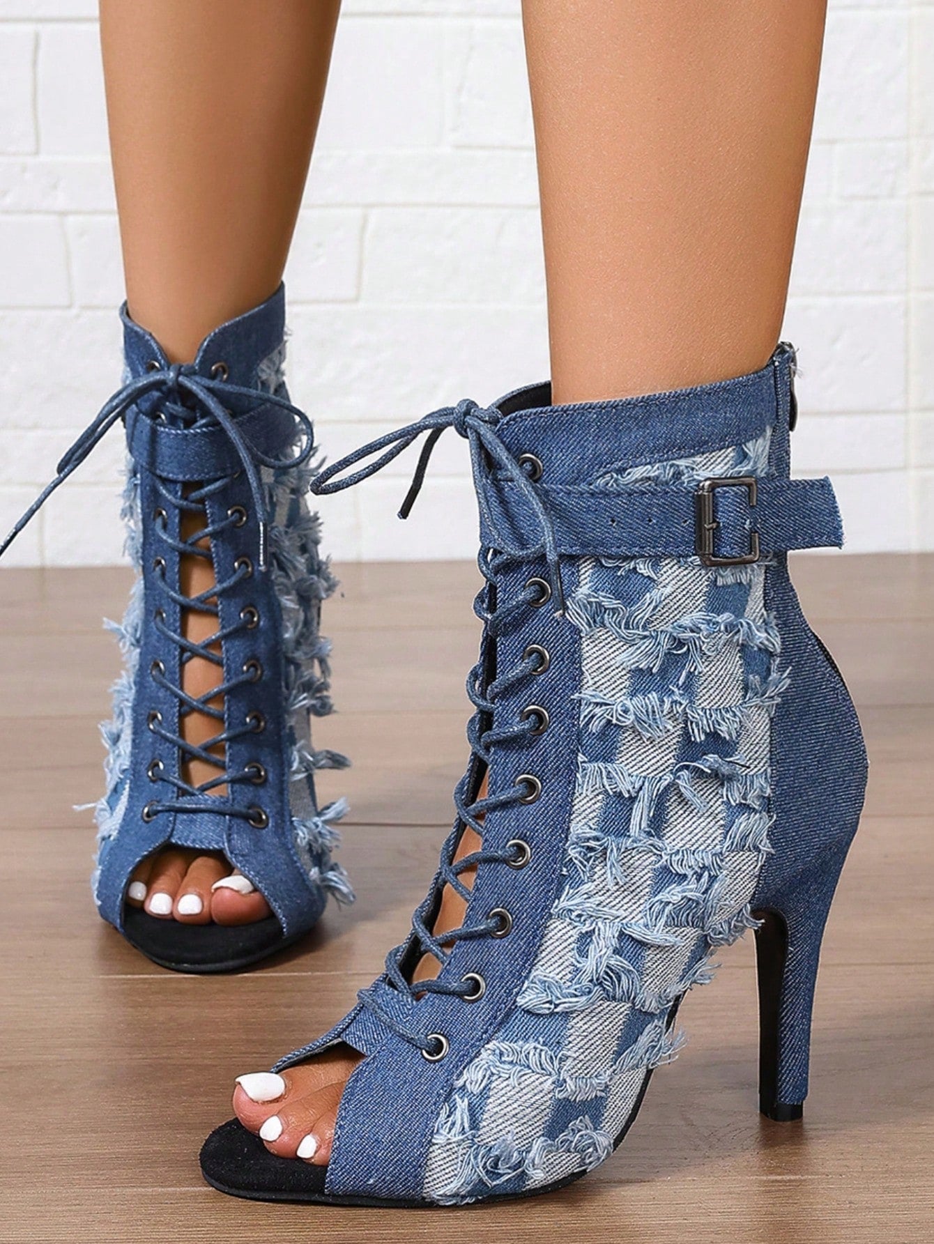 Step into bold style with these Elegant Blue Open-Toe High Heel Boots! Featuring a chic lace-up design and a soft outsole, they're perfect for dancing through all seasons. The gothic flair adds a daring twist to casual wear, while the open-toe vibe keeps things fresh and flirty. Whether you're hitting the dance floor or turning heads on the street, these boots deliver comfort and edge with every step.