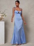 Turn heads at every summer wedding with this Elegant Blue Satin Fitted Maxi Dress. Its smooth satin fabric hugs your silhouette, while the shell bust and delicate spaghetti straps add a flirty, breezy vibe. Feel both graceful and comfy as you dance the night away in this effortlessly chic look. Perfect for those who want to shine with subtle glamour and a splash of playful elegance.