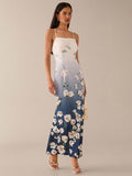 Step out in style with this playful blue and white floral gradient halter dress. Perfect for romantic dates or lively city adventures, its flattering silhouette and breezy design keep you comfortable and chic all day long. Embrace the charm of delicate florals blended with a fresh gradient for a look that’s effortlessly captivating.