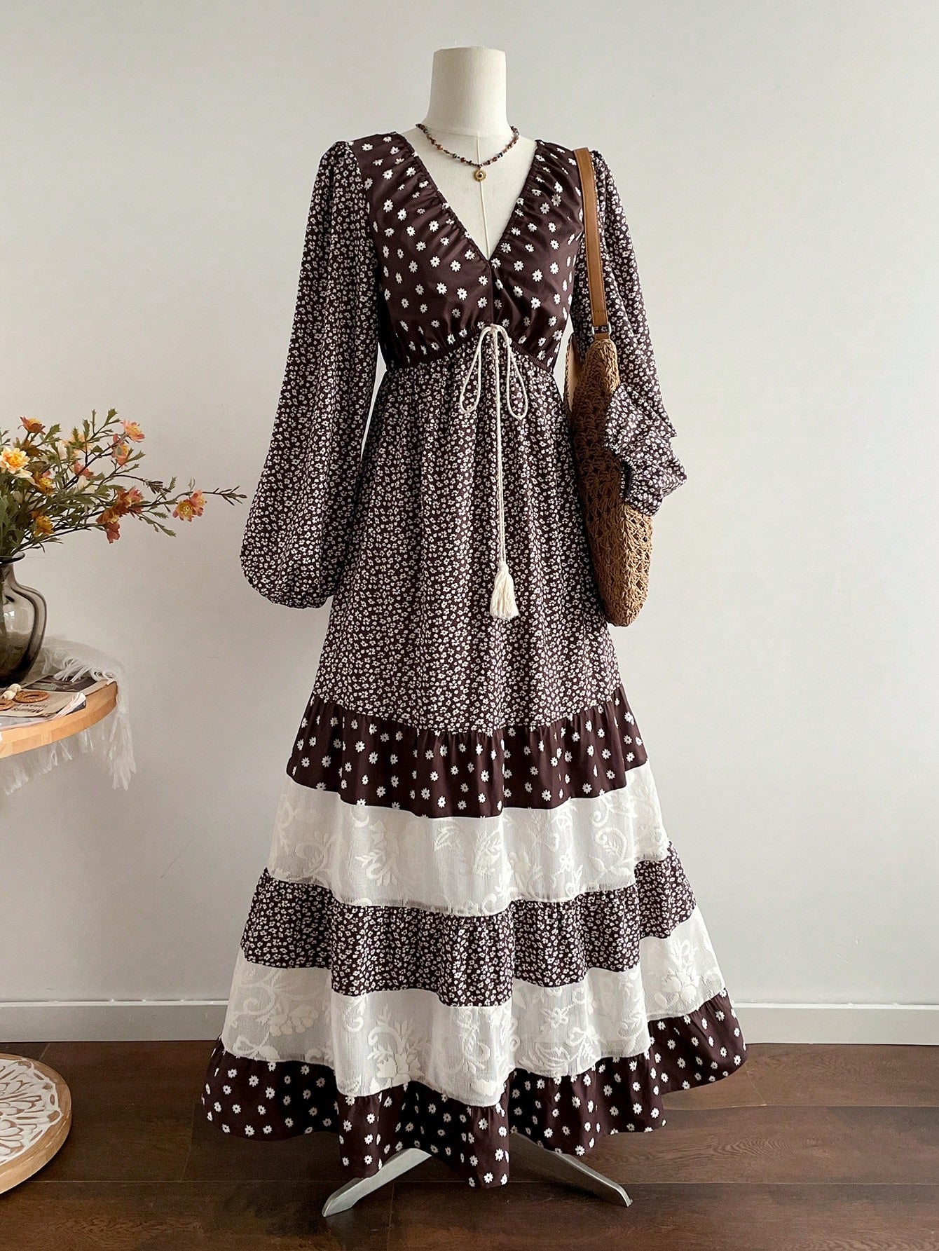 Twirl into any occasion in this stunning bohemian beauty! Featuring delicate floral lace detailing and a flattering V-neckline, this dress effortlessly transitions from lazy beach days to festive celebrations. The pleated design adds graceful movement and dimension, while the relaxed silhouette keeps you comfortable and chic. Perfect for vacations, garden parties, or whenever you want to channel effortless elegance with a boho twist. Dress it up with heels or keep it casual with sandals—this versatile piece