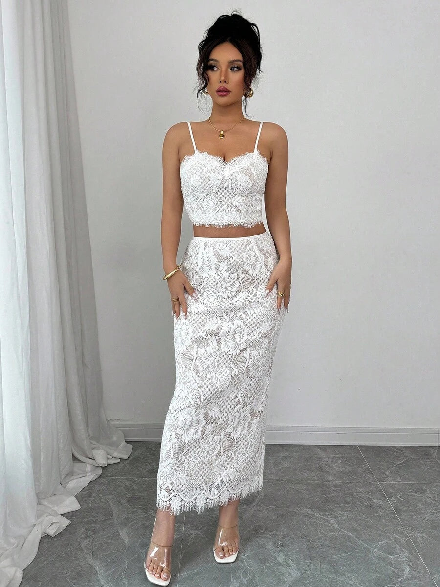 Escape to effortless elegance with this dreamy two-piece set! Delicate lace trim adorns the spaghetti strap top, while the flowing skirt moves with every twirl. Perfect for sunset beach strolls, garden parties, or spontaneous adventures—this bohemian beauty brings that carefree, romantic vibe to any summer occasion. Mix, match, or wear together for instant vacation-ready style that feels as good as it looks.