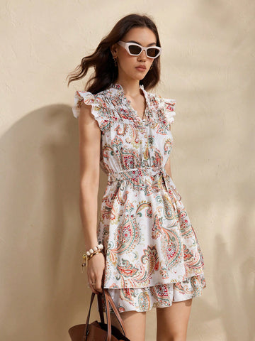 Embrace your free spirit in this whimsical bohemian dress! With playful cap sleeves, a flattering tie-up waist, and a flirty ruffled hem, you'll be turning heads wherever your adventures take you. The eye-catching print adds just the right amount of fun to your vacation wardrobe – because life's too short for boring clothes!