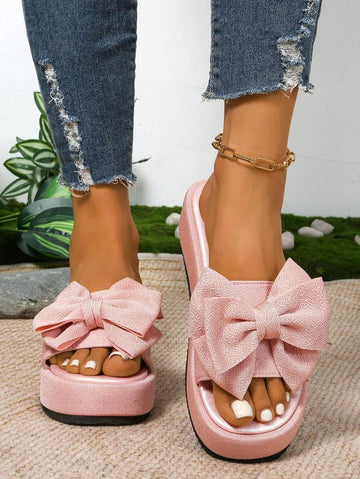 Step up your style game with these Elegant Bowknot Thick Platform Slip-On Sandals! Perfectly playful in rose red and black, they feature a chic bowknot detail and a waterproof design that keeps your feet comfy and dry. The thick platform adds height without the hassle, making every step feel like a breeze. Slip them on and strut your stuff wherever the day takes you!