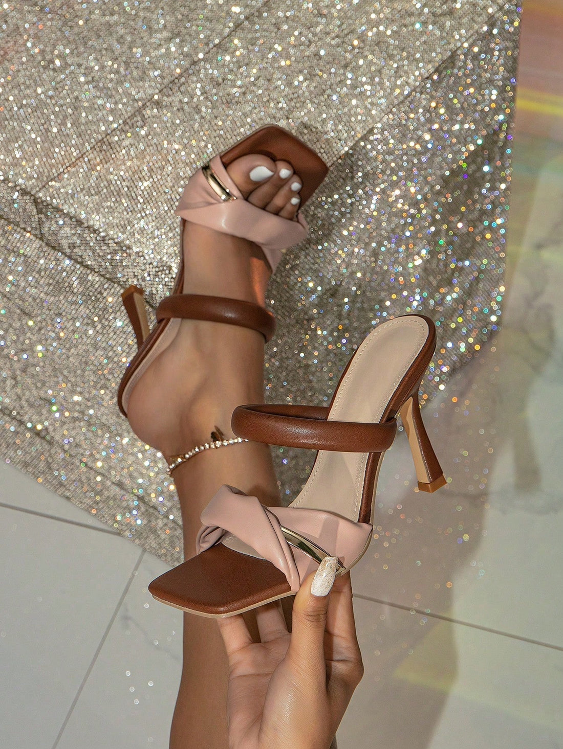 Step into sophistication with these stunning brown high-heeled mules that effortlessly blend elegance with everyday wearability. Crafted for the modern woman who refuses to compromise on style, these versatile sandals transition seamlessly from outdoor adventures to upscale banquet events. The rich brown hue pairs beautifully with virtually any outfit, while the elevated heel adds a flattering silhouette and confident stride. Whether you're dressing up for a special occasion or elevating your casual look, t