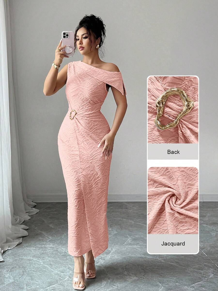 Elevate your wardrobe with this sophisticated brown jacquard dress, designed for the modern woman who appreciates refined details. The luxurious jacquard fabric creates visual depth and texture, while carefully placed metal accents and a statement buckle detail add contemporary edge to a timeless silhouette. Perfect for both professional settings and upscale casual occasions, this dress combines elegance with understated glamour. 