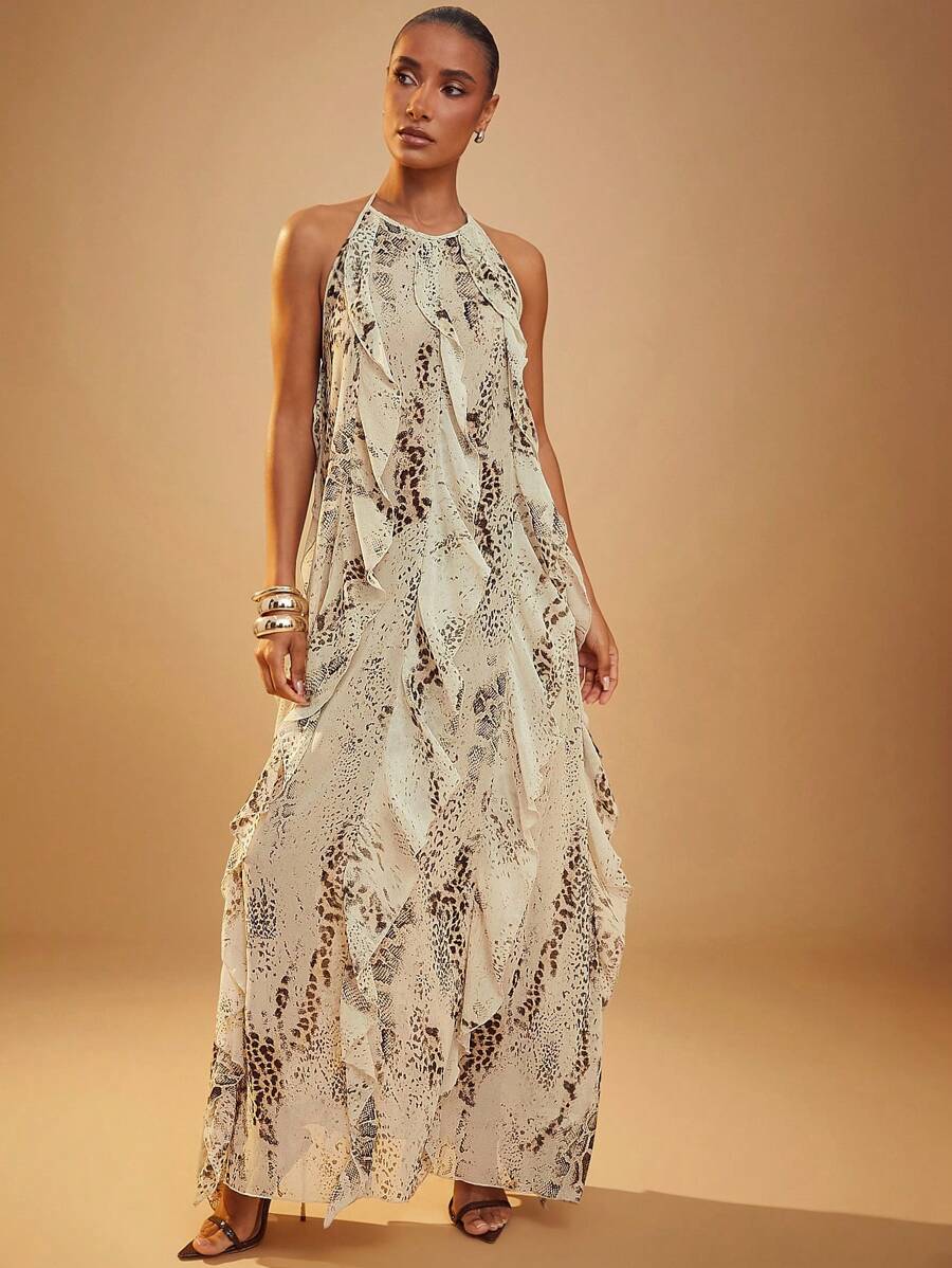 Turn heads wherever you go in this Elegant Brown Leopard Print Maxi Dress. With its playful halter neck and fluttery sleeveless ruffles, it’s the perfect mix of fierce and flirty. Whether you're dressing up for a party or keeping it casual, this maxi dress offers effortless style and comfort all day long. Let your wild side shine with every step!