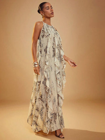 Step into summer fun with this playful brown leopard print maxi dress. Featuring a flirty halter neck and charming ruffles, it blends wild style with breezy comfort. Perfect for lively parties or relaxed outings, this dress adds a dash of bold elegance wherever you go.