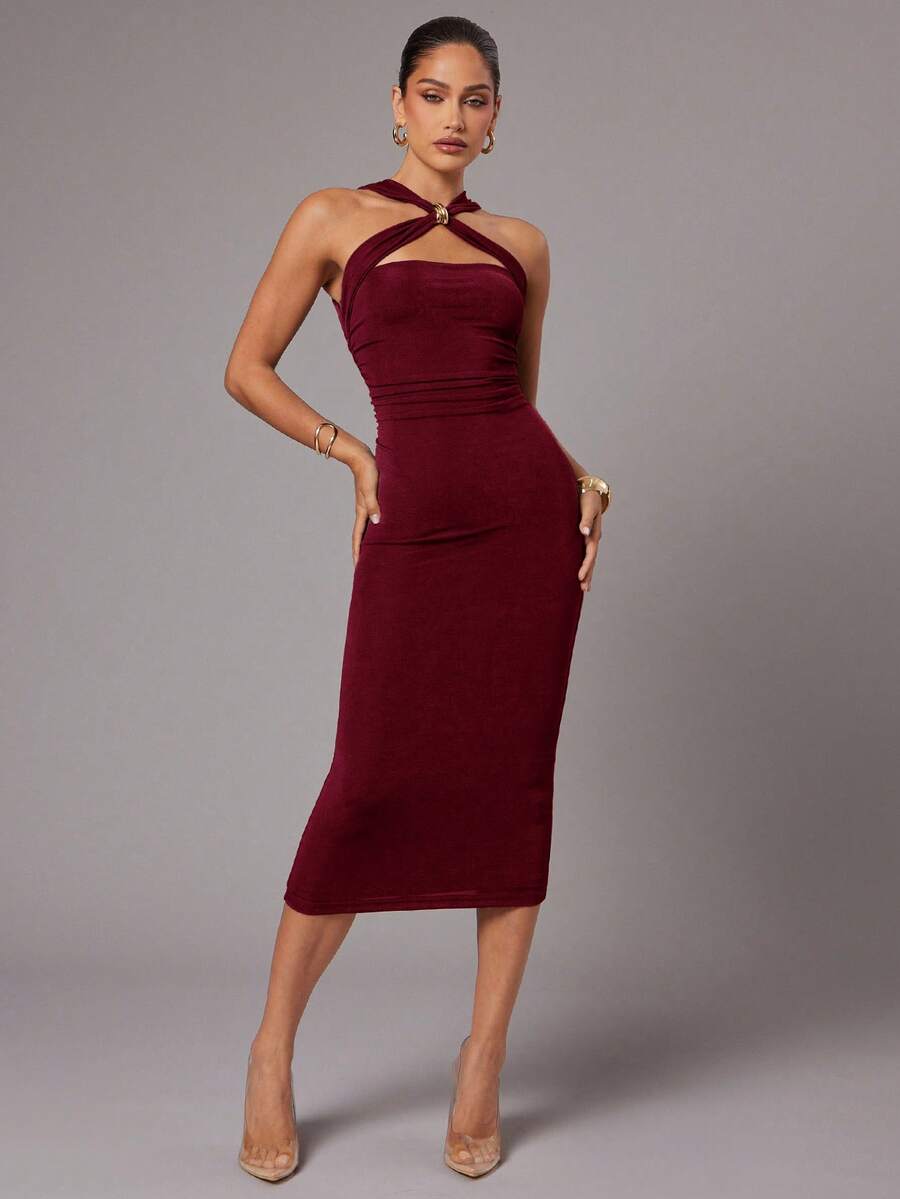 Slip into sophistication with this stunning brown pleated midi dress that's ready to turn heads at your next special occasion. The graceful pleats add movement and dimension, while the midi length strikes the perfect balance between chic and timeless. Whether you're heading out for a romantic dinner or celebrating with friends, this versatile piece pairs beautifully with heels, strappy sandals, or even sleek boots. The rich brown tone complements all skin tones and works seamlessly with your existing wardro