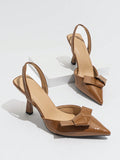 Step into the spotlight with these elegant brown pointed toe high heels, designed to add a playful twist to your spring and summer party looks. Featuring charming bows and secure ankle straps, they blend sophistication with a flirty vibe. Perfect for dancing the night away or turning heads at any event, these heels bring both style and confidence to your wardrobe.