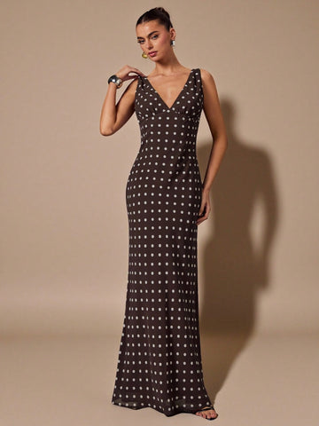 Turn heads this season in our stunning brown polka dot mermaid hem dress. The daring deep V neckline and sleeveless silhouette create an effortlessly sexy vibe, while the flowing chiffon fabric keeps you cool and comfortable. The playful polka dot pattern adds vintage charm, and the dramatic mermaid hem gives you that show-stopping moment when you move. Perfect for spring and summer occasions where you want to feel confident and fabulous.