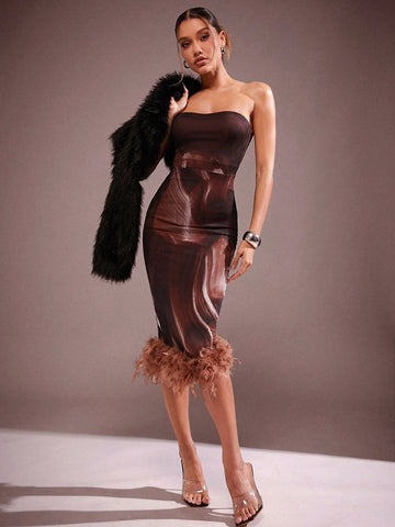 Turn heads this winter in our Elegant Brown Strapless Midi Dress, featuring a chic feather trim that brings a touch of whimsy to your party or concert look. The strapless design lets you flaunt your shoulders with confidence, while the midi length keeps your style sophisticated and warm. Perfect for dancing the night away or cozying up with friends, this dress combines comfort and flair in one unforgettable outfit.