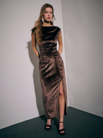 Slip into sophistication with this stunning brown velvet gown that's ready to turn heads at any autumn soirée. The luxurious velvet fabric drapes beautifully while the pleated waistband cinches your silhouette with effortless elegance. Flowy side slits add a playful touch of movement and allure, making every step feel like a red carpet moment. Perfect for formal events, evening galas, or whenever you want to feel absolutely fabulous. This dress proves that timeless style never goes out of season.