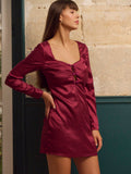 Turn heads this season in our stunning burgundy jacquard satin mini dress! The fitted silhouette hugs your curves in all the right ways, while the cheeky keyhole cut-out adds just the right amount of flirtation. Rich jewel tones and luxe satin fabric make this your go-to pick for autumn soirées, holiday parties, and any occasion calling for a touch of glamour. Dress it up with heels and statement jewelry, or keep it playfully casual—this versatile number does it all.