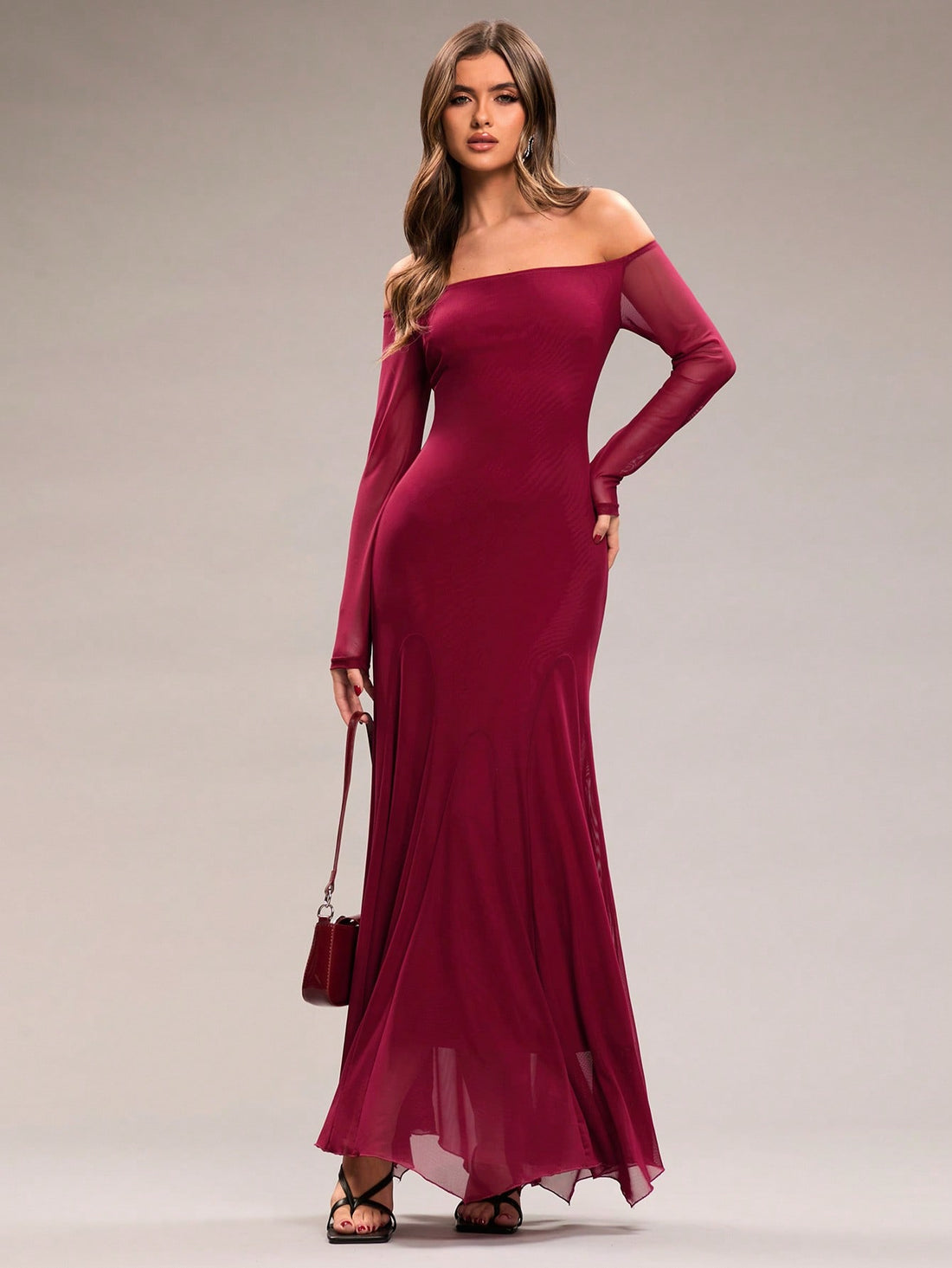Celebrate Valentine's Day in style with this elegant burgundy maxi dress! The off-shoulder design and mesh long sleeves add a touch of romance, while the fishtail hem creates a flattering silhouette. Perfect for a classy and memorable date night.