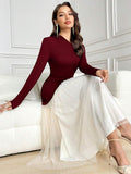 Elevate your evening wardrobe with this stunning burgundy dress, designed for modest elegance. The asymmetrical neckline and pleated details create visual interest, while the high-waisted A-line silhouette flatters your figure. Crafted from soft knitted polyamide with medium stretch, this long-sleeved dress offers comfort and sophistication for formal occasions, celebrations, and festive gatherings. 