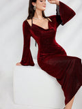 Make a statement in this Elegant Burgundy Red Wrap Draped Neck Bell Sleeve Long Evening Dress for Women. The wrap style flatters any figure, while the draped neck adds an elegant touch. The bell sleeves make a playful statement, perfect for any formal occasion. (No pun intended!)