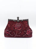 With beautiful burgundy rose embroidery and a vintage 1920s style, this elegant evening clutch is the perfect accessory for formal events. The intricate beadwork exudes timeless sophistication, making it a must-have for any wardrobe. Elevate your look and make a statement with this stunning purse.