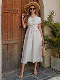 Discover the ultimate summer must-have with our Elegant Button-Down Short Sleeve Maxi Dress. Combining effortless style and comfort, this versatile dress is perfect for any occasion. With its elegant button-down design and short sleeves, it's the perfect blend of beauty and functionality. Upgrade your summer wardrobe now!
