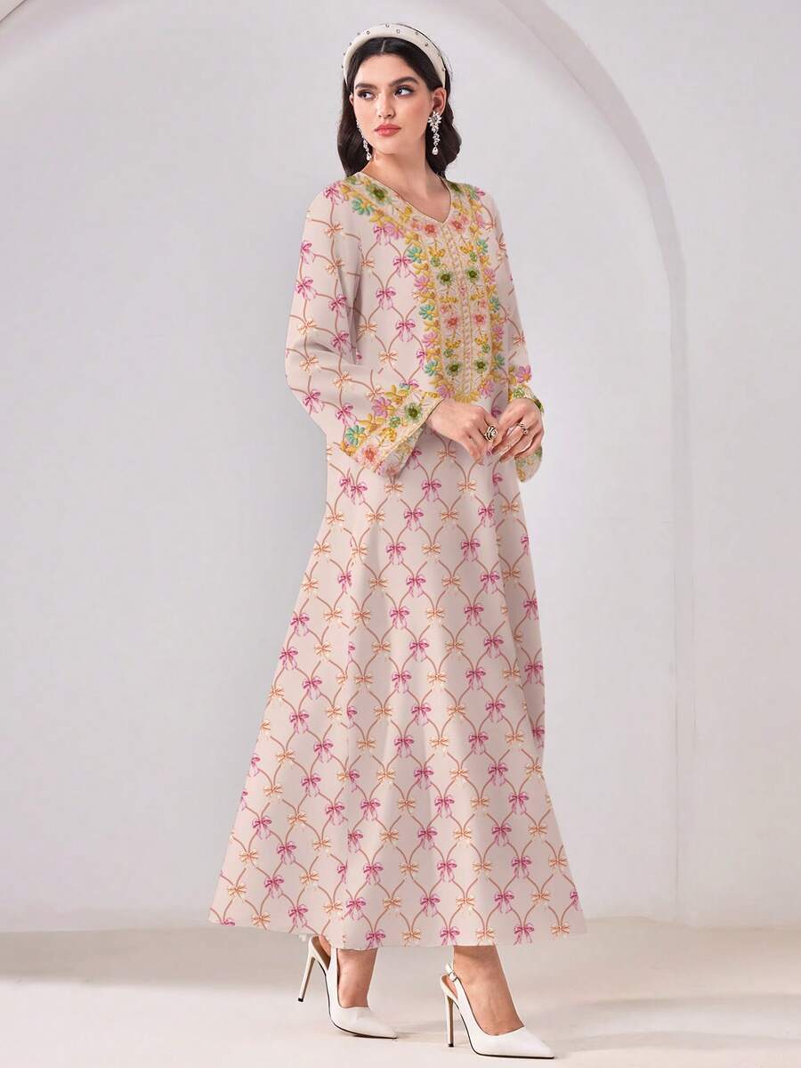Embrace modest elegance with this Arabic-inspired tunic dress, designed for effortless sophistication. Featuring a flattering V-neckline and geometric botanical patterns in multicolor, this loose-fitting long-sleeve piece transitions seamlessly from casual outings to formal occasions. The natural mid-waist silhouette and flowing length create a graceful, timeless look perfect for dating, evening events, and festive celebrations like Ramadan and Eid. 