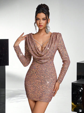 Step into the spotlight with this Elegant Champagne Sequined Dress, featuring a daring deep V-neck and shimmering sequins that catch every eye. The detachable pearl chain adds a touch of playful sophistication, perfect for weddings or any special event where you want to sparkle and shine. Feel glamorous, confident, and ready to dance the night away!