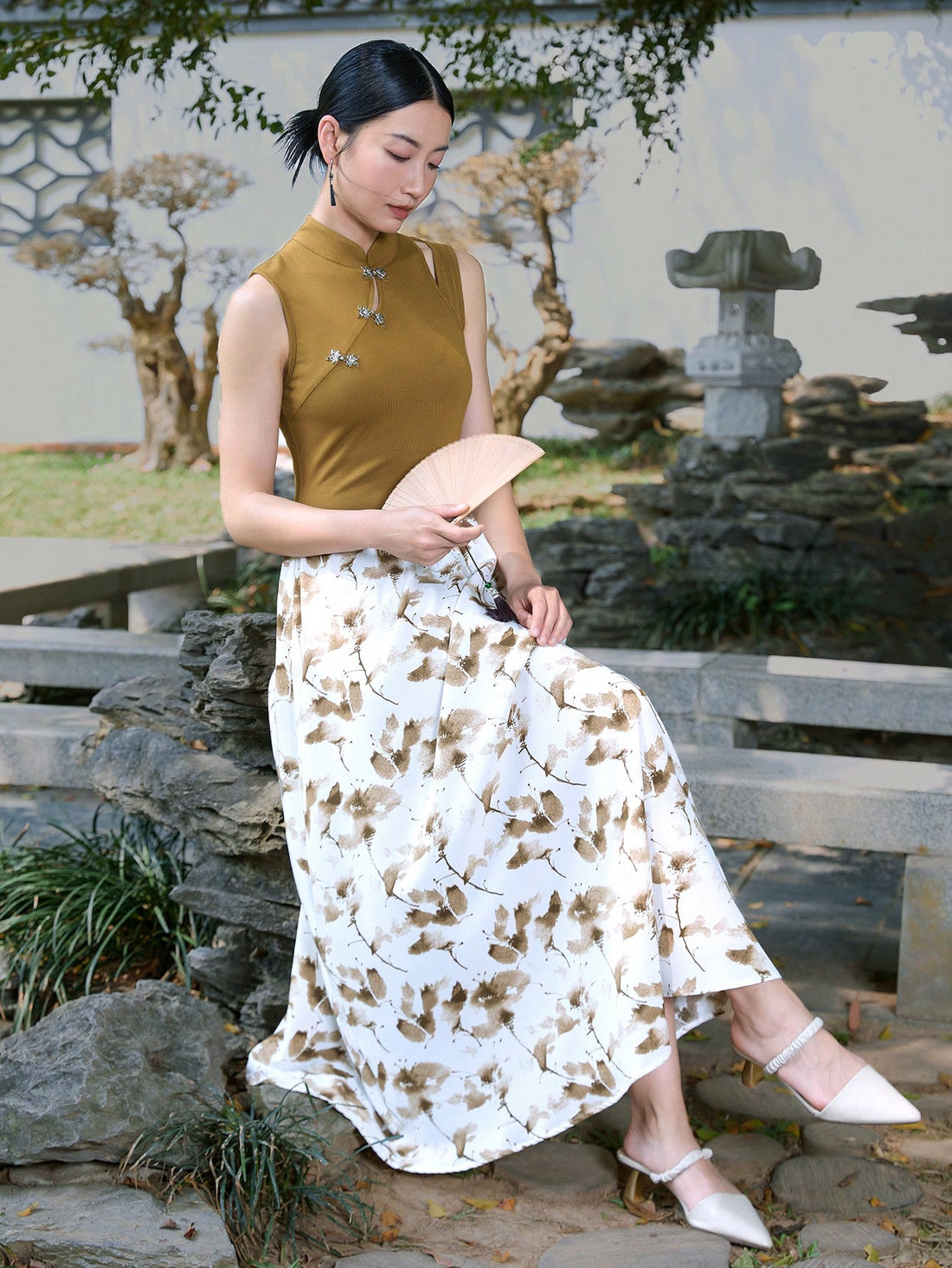 Turn heads effortlessly in this playful sleeveless cheongsam that blends classic Chinese elegance with vibrant color blocking. Perfect for resort days, its light, flattering fit keeps you cool while boasting a chic silhouette that brightens any getaway. Whether sipping cocktails poolside or strolling sandy shores, this dress adds a splash of fun sophistication to your vacation wardrobe.