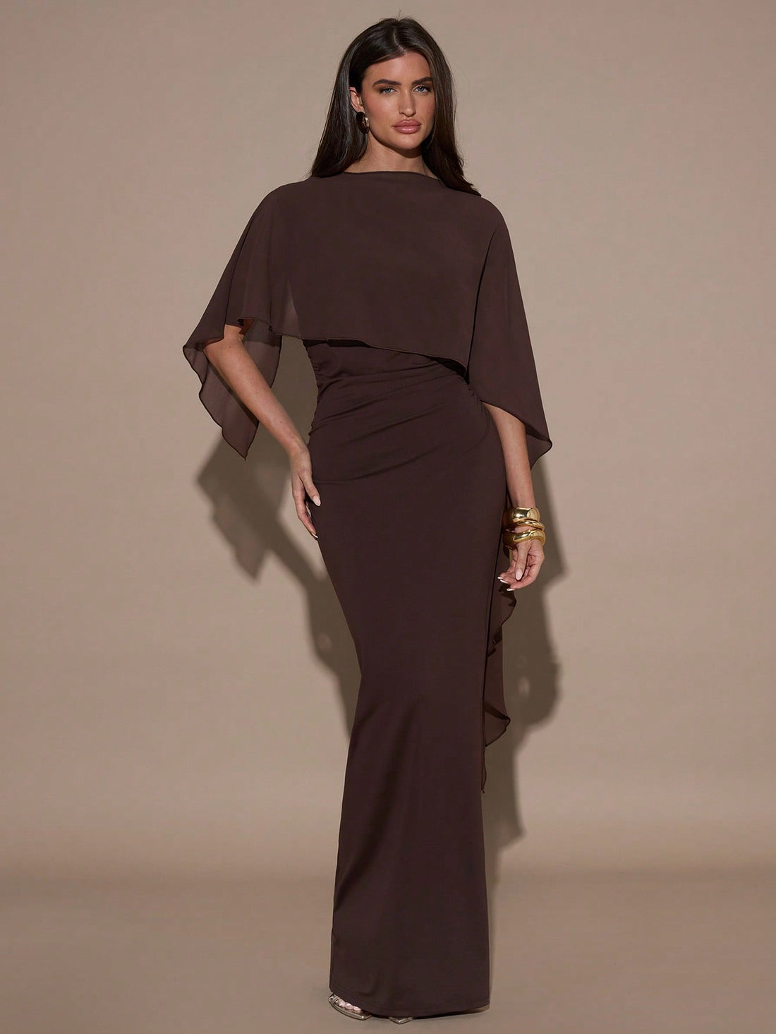 Slip into sophistication with this stunning chocolate brown slim fit dress—your new go-to for turning heads at cocktail parties and formal events. The flattering silhouette hugs in all the right places, while the rich, versatile brown shade pairs effortlessly with any accessory collection. Whether you're celebrating a special occasion or making a statement at an upscale gathering, this dress delivers timeless elegance with a modern edge. Dress it up with heels and jewelry, or keep it chic and understated. B