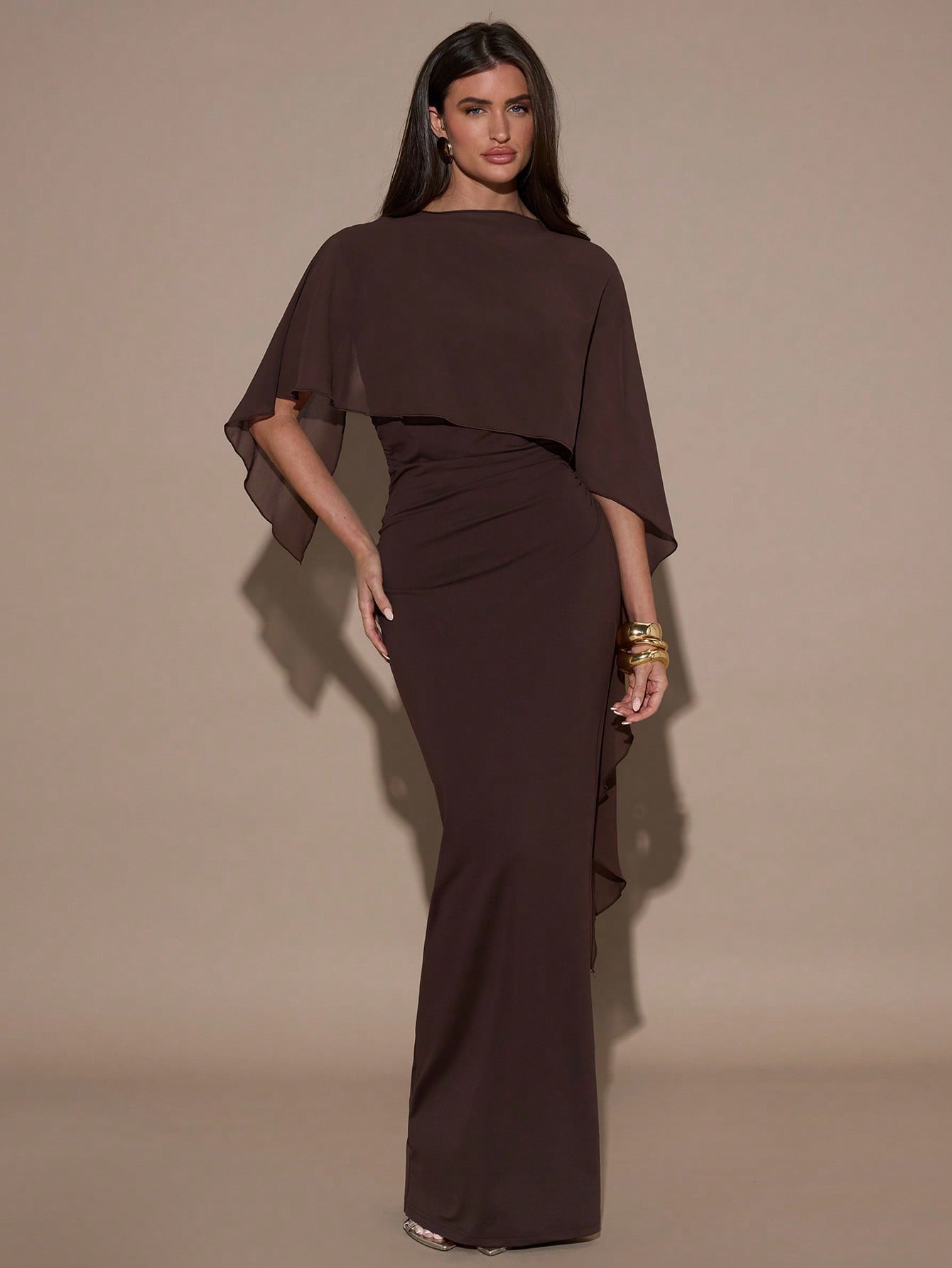 Slip into sophistication with this stunning chocolate brown slim fit dress—your new go-to for turning heads at cocktail parties and formal events. The flattering silhouette hugs in all the right places, while the rich, versatile brown shade pairs effortlessly with any accessory collection. Whether you're celebrating a special occasion or making a statement at an upscale gathering, this dress delivers timeless elegance with a modern edge. Dress it up with heels and jewelry, or keep it chic and understated. B