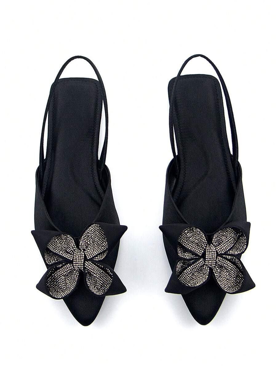 Step into charm with these elegant chocolate brown slip-on flat sandals, featuring a playful flower bow adorned with sparkling cubic zirconia. Designed for comfort and style, they effortlessly brighten any outfit while keeping your feet happy all day long. Perfect for adding a touch of whimsy to your look!