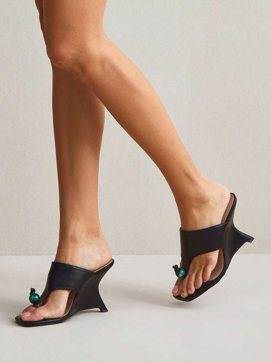 Step into style with our Elegant Chunky Wedge Heeled Sandals—the ultimate go-to for women who refuse to compromise on comfort or flair. These beauties feature a sturdy wedge heel that keeps you elevated without the foot fatigue, paired with a sleek silhouette that works from brunch to beach days. Whether you're running errands around town or jet-setting on your next adventure, these versatile sandals slip on effortlessly and pair with everything in your closet. Durable construction meets playful elegance, m