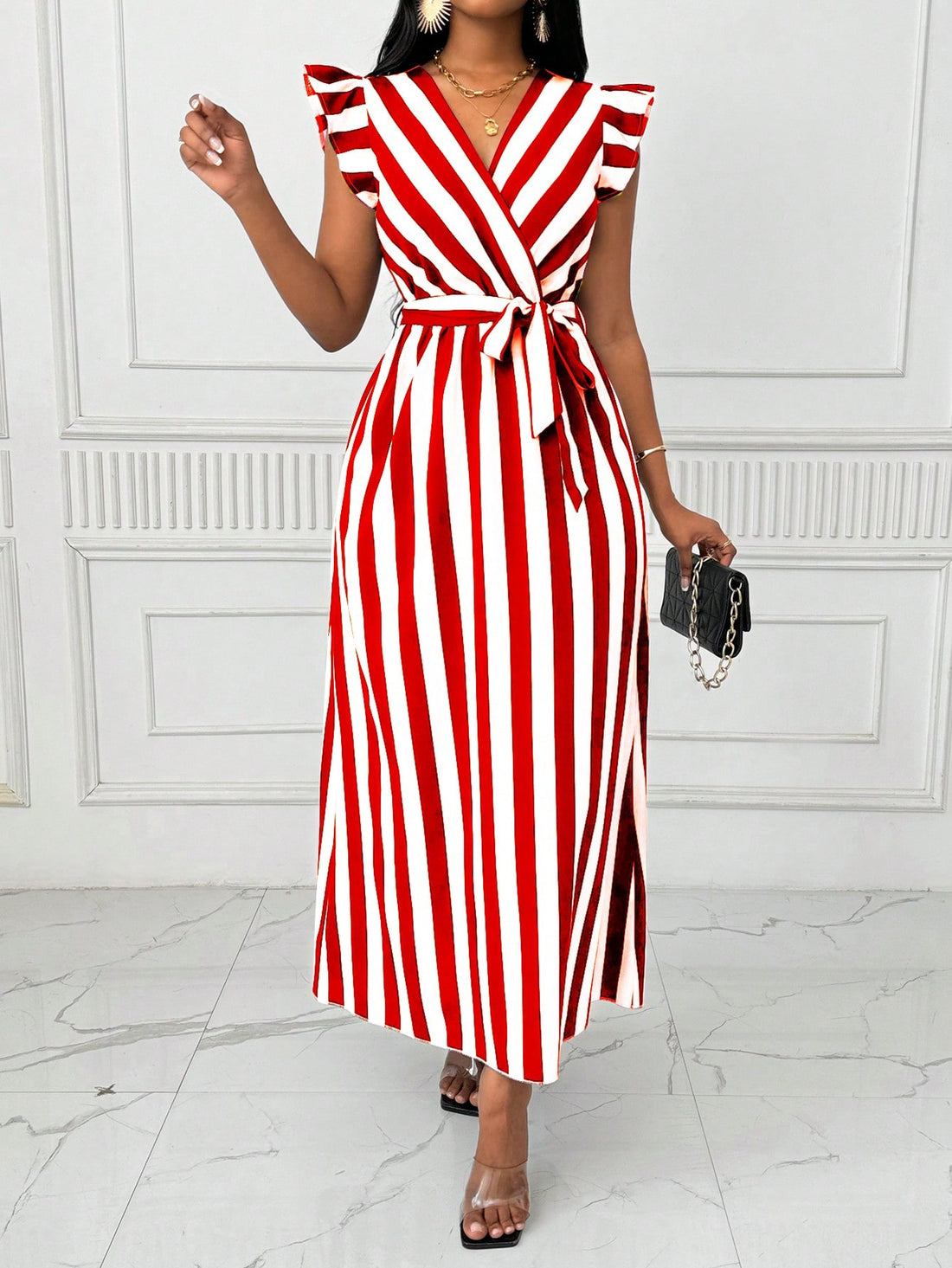 Step out in style with our Elegant Cinched Waist Maxi Dress. Featuring a flattering bow tie detail and eye-catching vertical stripes, this dress is perfect for any occasion. Plus, the cinched waist will accentuate your figure for a confident and elegant look. Own the room with this dress today!