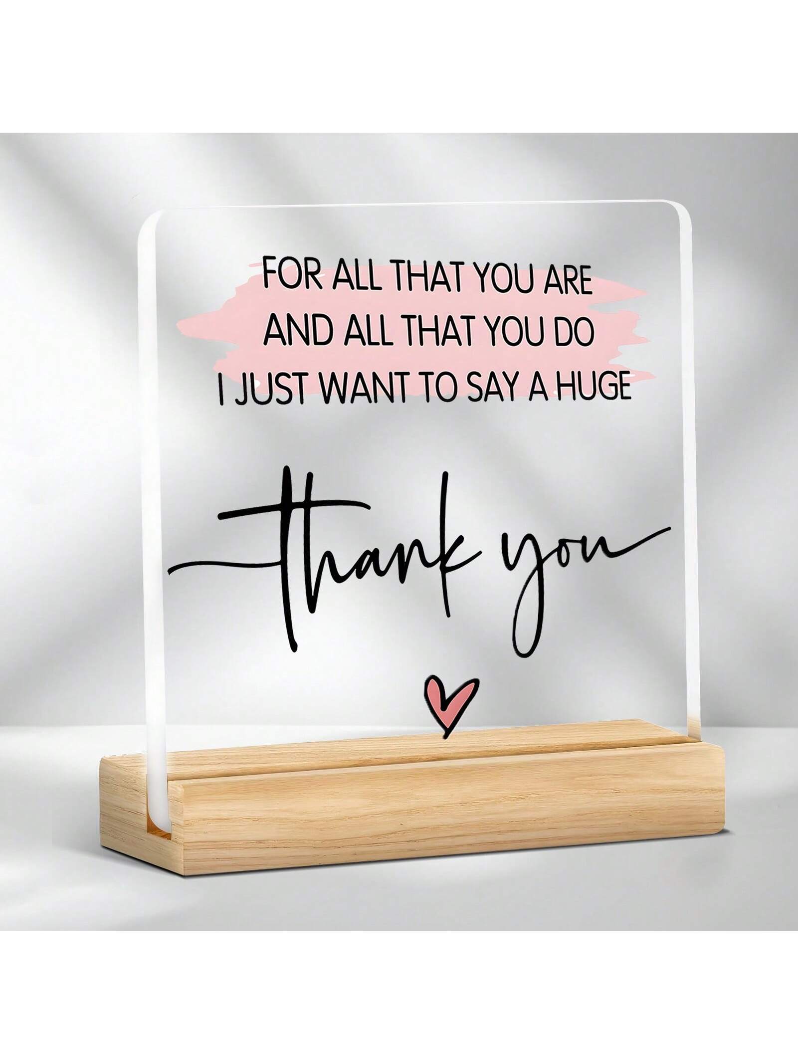 This decorative plaque is a charming way to show your appreciation for any occasion. With an elegant clear acrylic design and included wooden stand, it's both stylish and versatile. A perfect gift that's sure to impress (without breaking the bank)!