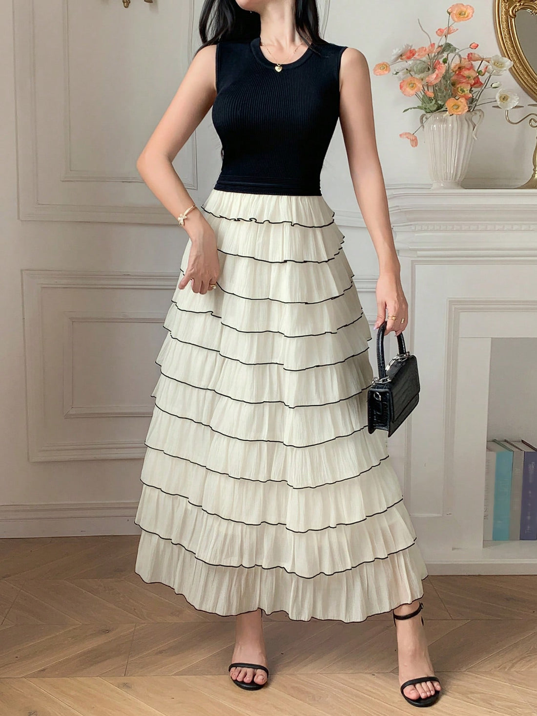 Step into summer with this playful colorblock sleeveless midi dress, designed to turn heads with its vibrant panels and flirtatious ruffled details. Lightweight and breezy, it keeps you cool while adding a splash of fun and elegance to your wardrobe. Perfect for sunny days or casual evenings, this dress lets you mix comfort with bright style effortlessly.