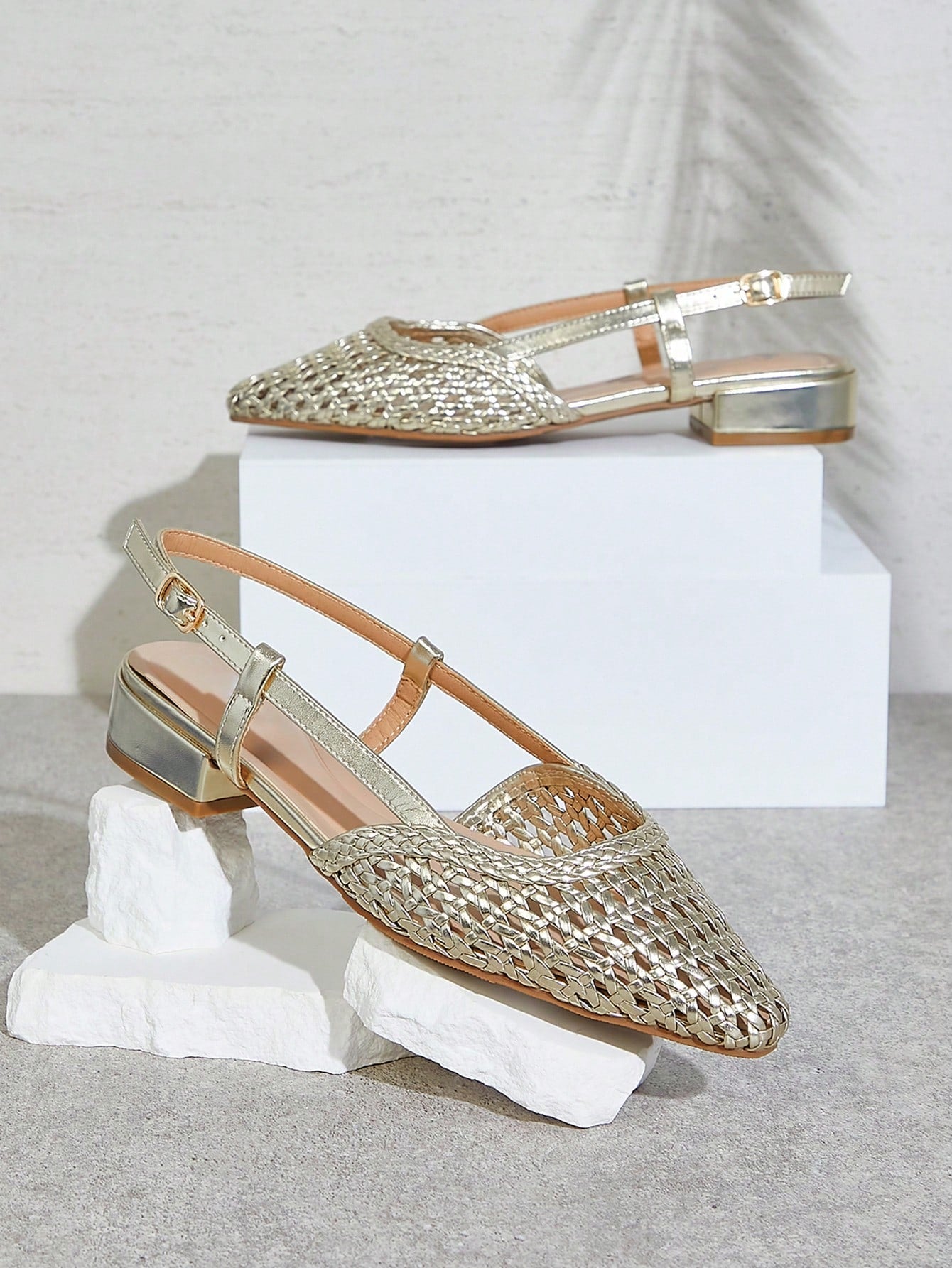 Step out in style with Elegant Comfort's Slingback Braided Ballet Flats! Featuring a stunning gold heel and comfortable slingback design, these flats will elevate any outfit. Perfect for a day out or a night on the town, these flats offer both fashion and comfort.