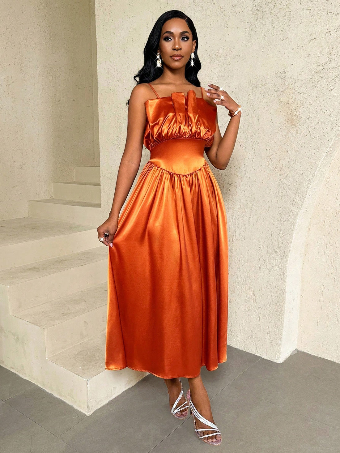 Turn heads with this playful coral orange slip dress that flatters every curve thanks to its chic cinched waist. Perfect for day-to-night adventures, its vibrant hue adds a pop of fun to any occasion while keeping comfort effortlessly stylish. Whether you're out for brunch or dancing the night away, this dress is your go-to for easy elegance with a lively twist.