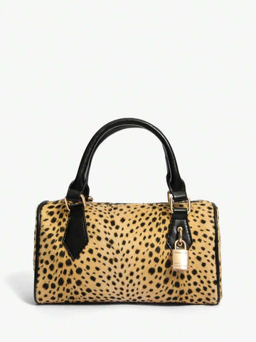 Moo-ve over, basic bags! This chic cow print top handle bag brings a playful twist to your everyday style. Featuring a striking black-and-white print that turns heads, it's paired with a gleaming golden padlock detail that adds just the right touch of vintage glamour. The structured top handle makes it perfect for everything from coffee runs to weekend adventures, while the compact silhouette keeps you looking effortlessly put-together. Whether you're channeling retro vibes or just want to add some personal