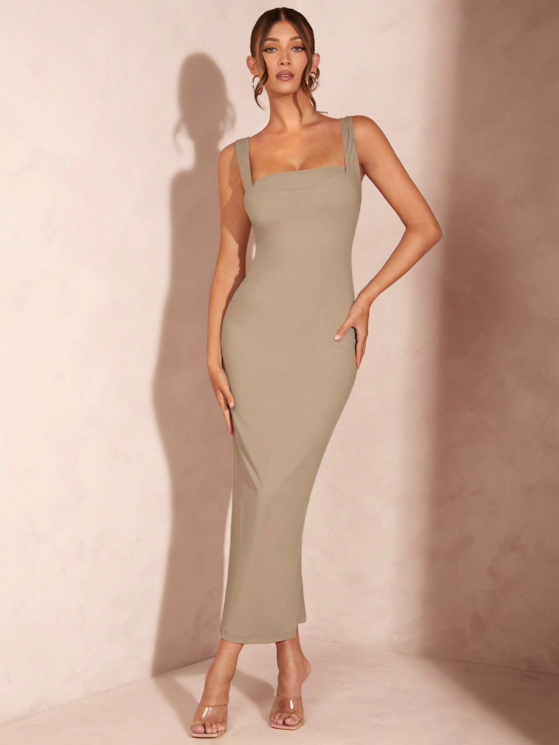 Indulge in luxury with this Elegant Cream 2-in-1 Bodycon Dress with Square Neck. Perfect for those who appreciate the finer things in life, this dress exudes Old Money style. The square neck adds a touch of sophistication while the bodycon design flatters your figure. Step out in style with this gorgeous long dress.