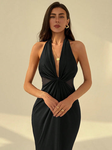 Make a statement with this head-turning maxi dress! The cross-front twist adds a flirty touch, while the open back guarantees all eyes on you as you walk away. The fishtail design creates a mermaid-like silhouette that's perfect for twirling on the dance floor or making a grand entrance. Elegance meets fun in this show-stopping piece!