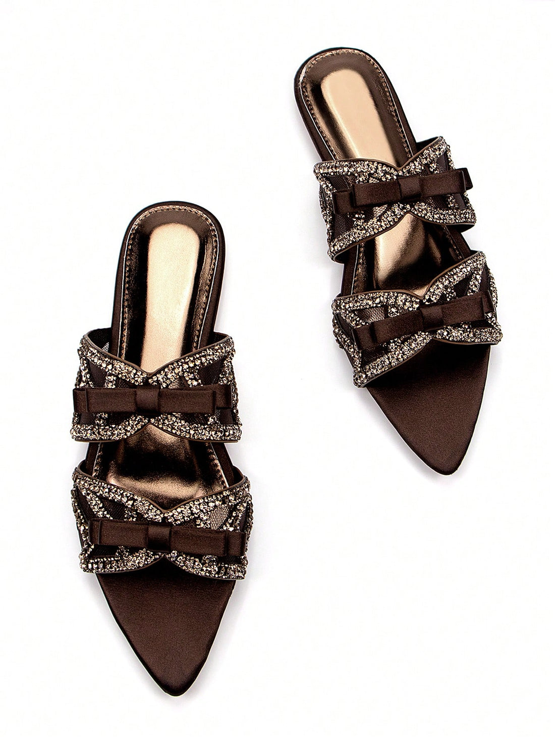 Step into effortless chic with our Crystal Butterfly Mules! These playful brown suede slip-ons feature dazzling crystal butterfly embellishments that catch the light with every step. Perfect for jazzing up your daily outfits or adding a touch of whimsy to party ensembles. Comfy enough for all-day adventures, yet stylish enough to turn heads—these mules are the fun fashion sidekick your wardrobe's been missing!