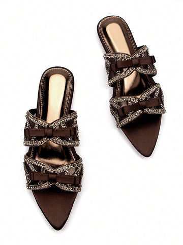 Step into effortless chic with our Crystal Butterfly Mules! These playful brown suede slip-ons feature dazzling crystal butterfly embellishments that catch the light with every step. Perfect for jazzing up your daily outfits or adding a touch of whimsy to party ensembles. Comfy enough for all-day adventures, yet stylish enough to turn heads—these mules are the fun fashion sidekick your wardrobe's been missing!