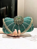 Elevate your evening look with our Elegant Dark Green Rhinestone Clutch. Perfect for special occasions, this clutch is adorned with sparkling rhinestones in a rich dark green hue. With its sleek design and spacious interior, it's the ideal accessory for adding a touch of glamour to any outfit.