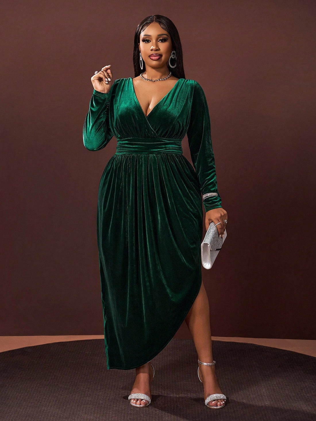 Step into the spotlight with this playful dark green velvet maxi dress, crafted for autumn-winter flair. Its deep V-neck adds a touch of daring elegance, while the asymmetric hem dances with every step, making every movement unforgettable. Perfect for special occasions, this dress wraps you in cozy velvet warmth with a twist of chic sophistication. Embrace the season in style and let your outfit tell a story as unique as you are!