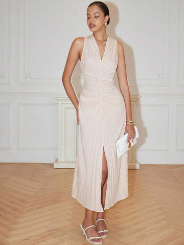 Step into the spotlight with this playful maxi dress featuring a deep V-neck and fluttery pleats that dance as you move. The high slit adds a cheeky twist, while the bow detail brings a flirty touch to this chic A-line silhouette. Perfect for sunny spring days and breezy summer evenings, it’s the ultimate party-ready piece that keeps things fun and effortlessly stylish.