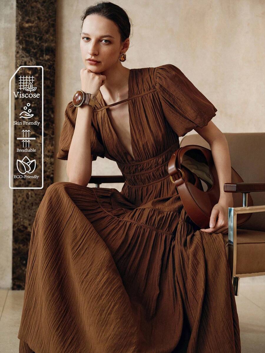 Exude Bold Sophistication in Our Elegant Deep V-Neck Puff Sleeve Dress!

Experience the perfect fusion of dramatic Victorian-inspired silhouettes and sharp, modern tailoring. This stunning statement dress is meticulously designed for the woman who values a high-fashion, "quiet luxury" approach to seasonal style—the ultimate centerpiece for prestigious fall galas, creative evening events, and high-authority social gatherings.

Iconic Sculpted Puff Sleeve Artistry: Featuring masterfully curated, voluminous sl