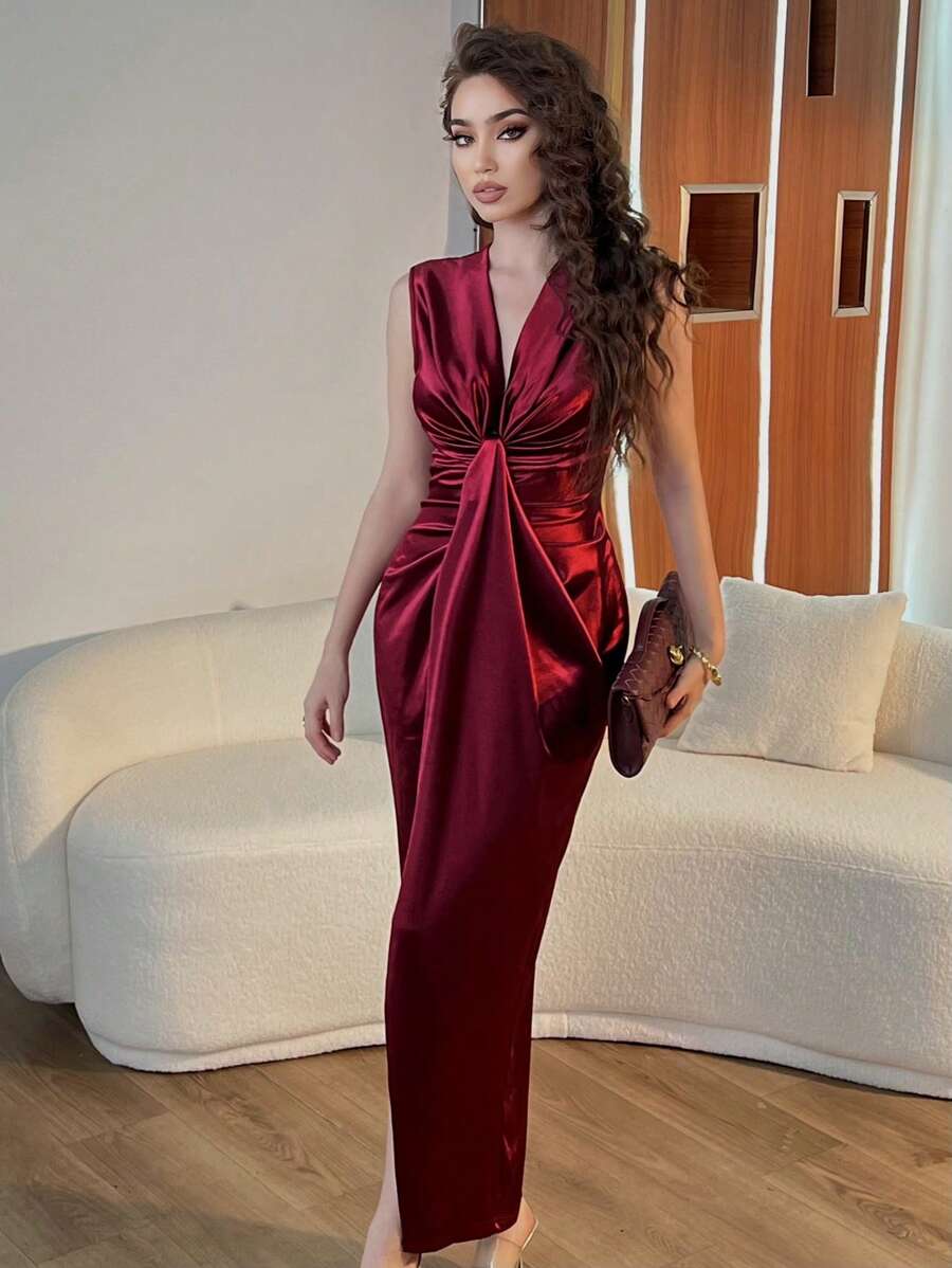 Step into style with this Elegant Deep V Neck Sleeveless Dress! Flattering your figure with a cinched waist and a daring slit hem, it's perfect for turning heads at any event. Light, breezy, and effortlessly chic—get ready to twirl, dance, and make every moment unforgettable!