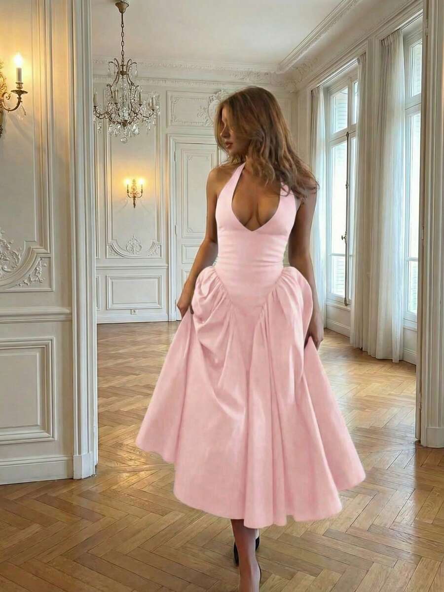 Front View of blush pink halter A-line cocktail dress with open back for wedding and party styling